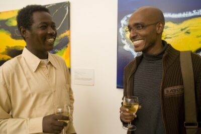 Al-Saddiq Al-Raddi and Sulaiman Addonia at the WPT Launch Party 2005. Sulaiman published his first novel, The Consequences of Love in 2008. Born in Eritrea, he spent a good deal of his childhood in Sudan and he and Saddiq were delighted to meet.