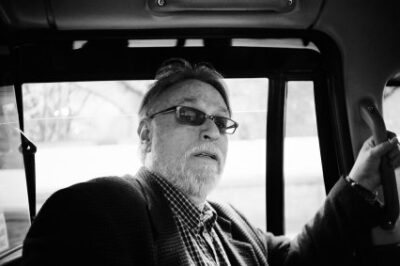 David Huerta in a taxi on his way to the Mexican Poets' Tour inaugural reading at The Cervantes Institute